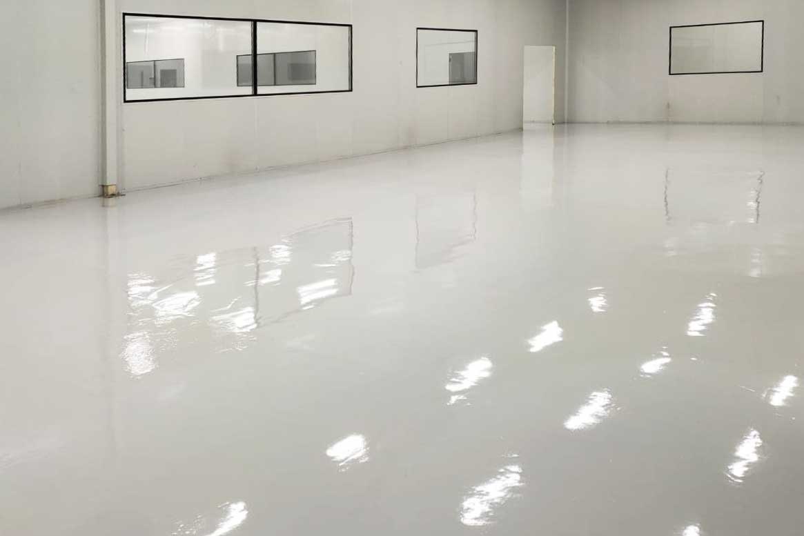 Resin flooring installation in Lambeth showing smooth, seamless floor finish